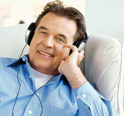 man listening with headset